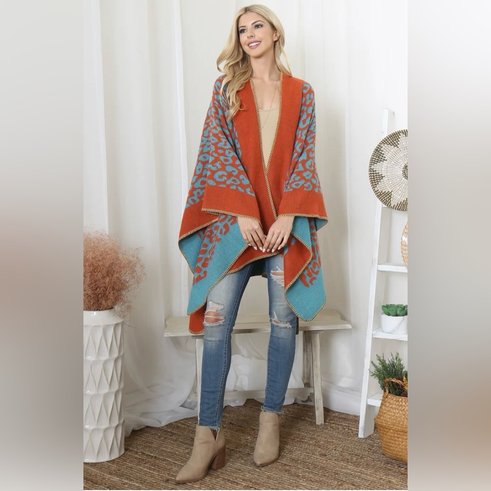 Wrap Poncho Beautiful Versatile. Wear on either side. 
Acrylic textile
#N013 - Picture 2 of 6